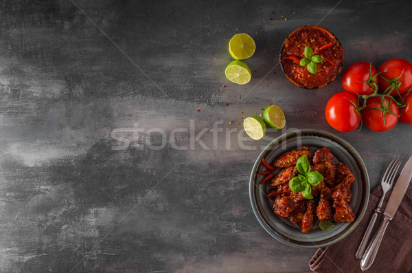 Tavuk kanatlar sıcak sos lezzetli yer metin Stok fotoğraf © Peteer
