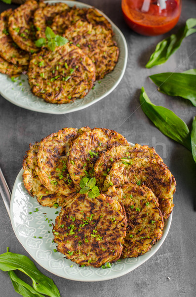 Potato pancakes fried with garlic Stock photo © Peteer