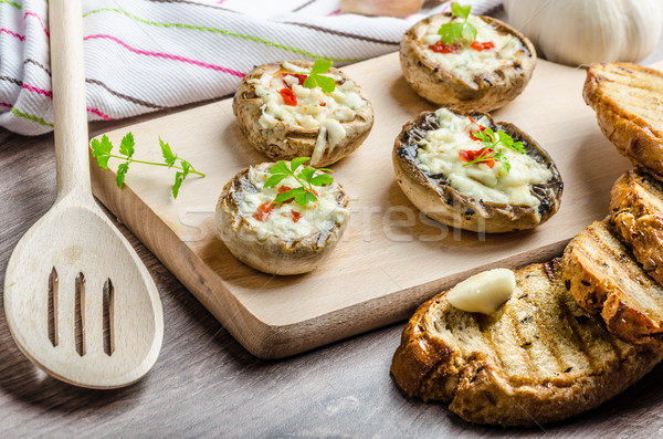 Grilled mushrooms stuffed cheese and chilli Stock photo © Peteer