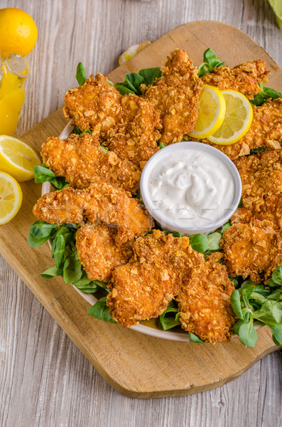 Chicken strips with delish garlic dip Stock photo © Peteer