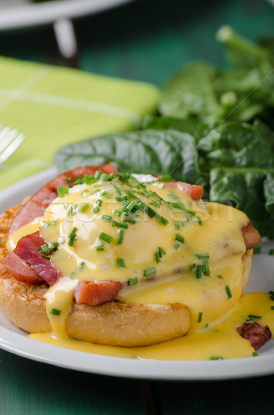 Egg benedict delish food, crispy bacon Stock photo © Peteer