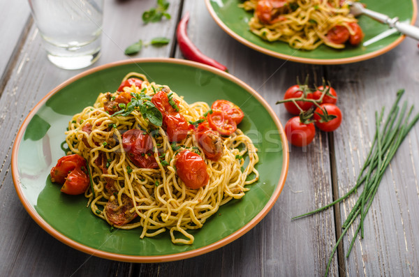 Stock photo: Homemade semolina spaghetti with cherry