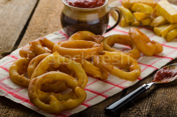 Onion rings, hot dip, french fries and Czech beer Stock photo © Peteer