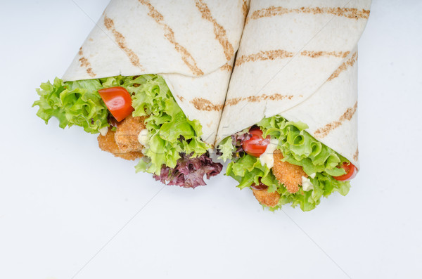 Grilled tortilla with chicken, mayo and tomato ketchu

Grilled tortilla chicken, lettuce, homemade Stock photo © Peteer