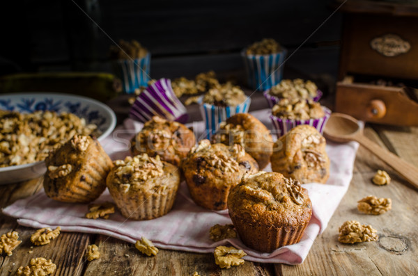 Stock photo: Whole grain muffins with dark chocolate and nuts