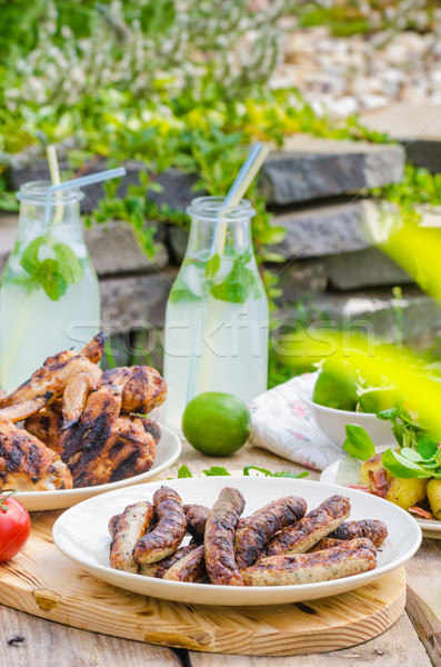 Delicious barbecue with lemonade Stock photo © Peteer