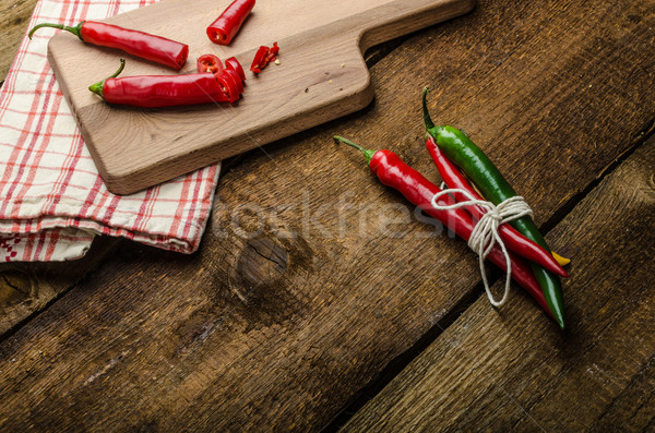 Chilli peppers, wood table, background Stock photo © Peteer