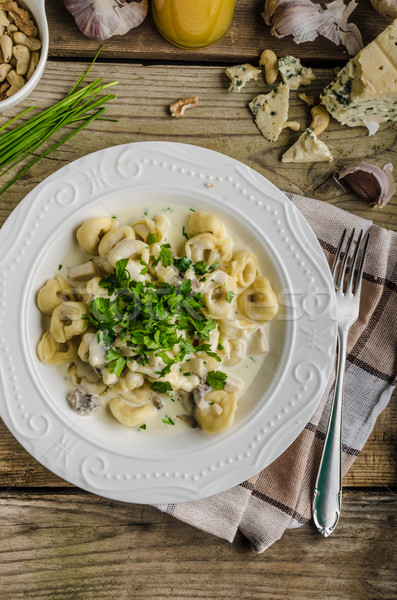 Tortellini with blue cheese sauce Stock photo © Peteer