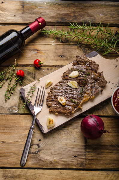 Rib eye steak with wine Stock photo © Peteer