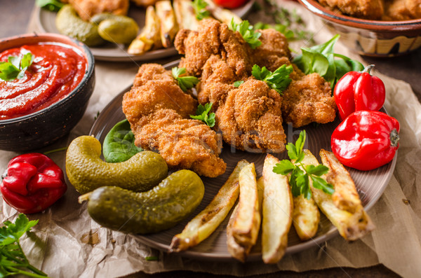 Eredeti sültkrumpli házi készítésű csípős szósz chilli paprikák Stock fotó © Peteer