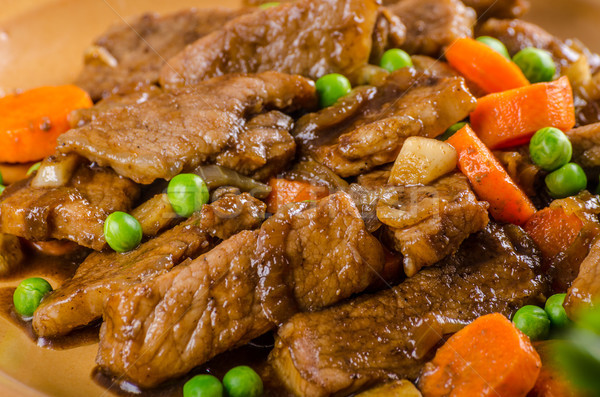 Pork medallions with vegetable and soy garlic sauce Stock photo © Peteer