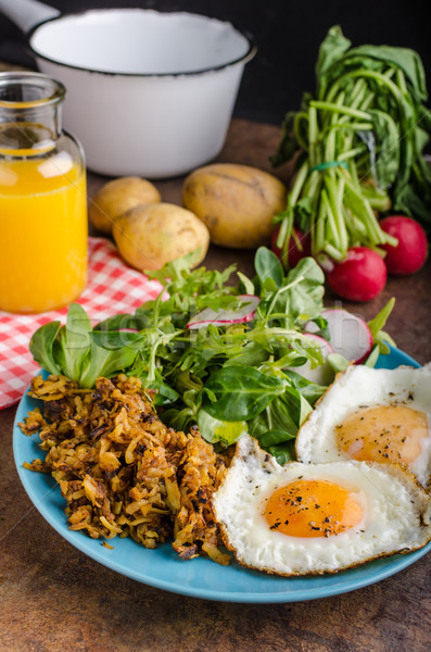 Hash Browns potato with eggs Stock photo © Peteer