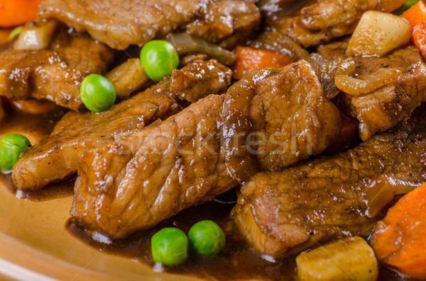 Pork medallions with vegetable and soy garlic sauce Stock photo © Peteer