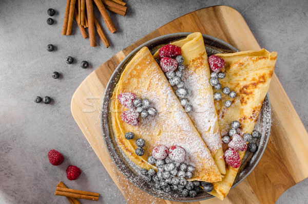 Cinnamon pancakes with blueberries Stock photo © Peteer