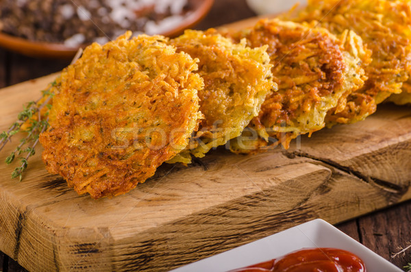 Delish potato pancakes with ketchup Stock photo © Peteer