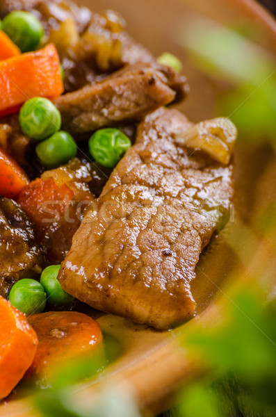 Pork medallions with vegetable and soy garlic sauce Stock photo © Peteer