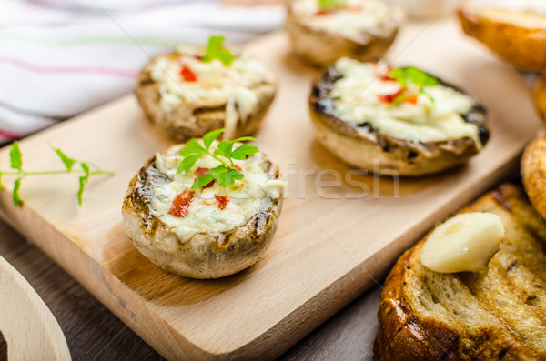 Grilled mushrooms stuffed cheese and chilli Stock photo © Peteer