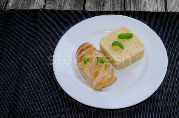 Grilled chicken breast with couscous and basil Stock photo © Peteer