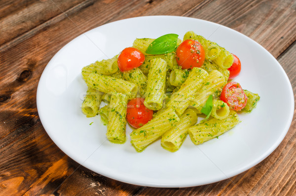Rigatoni pasta with genoese pesto and sherry tomato Stock photo © Peteer