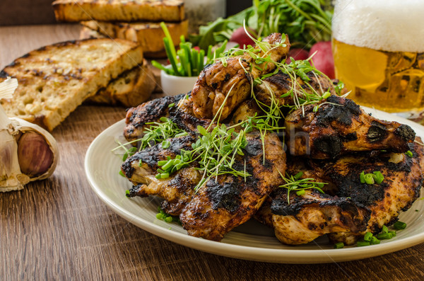 Grilled teriyaki chicken wings Stock photo © Peteer