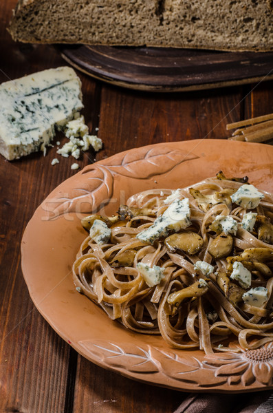 Pasta ostrica aglio funghi alimentare Foto d'archivio © Peteer