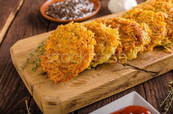 Delish potato pancakes with ketchup Stock photo © Peteer