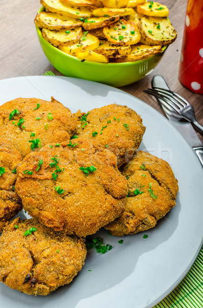 Crispy breaded mushroom schnitzel Stock photo © Peteer