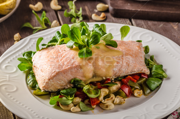 Salmon with hollandaise sauce and salad Stock photo © Peteer
