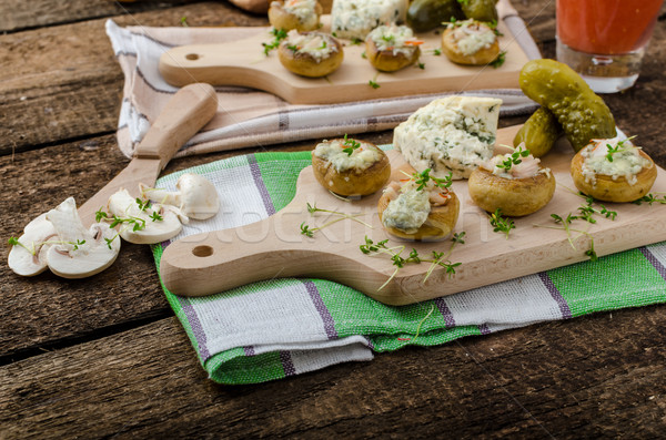 Stock photo: Mushrooms stuffed with cheese