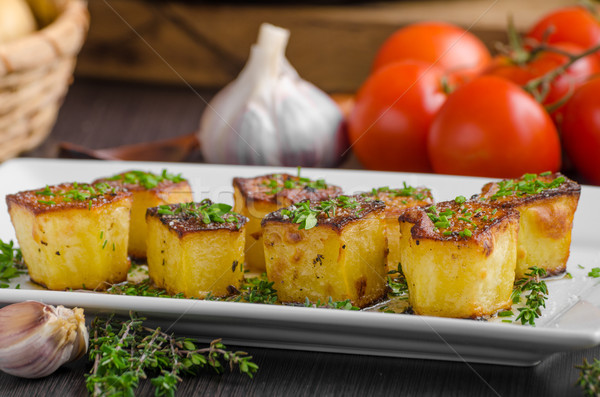 Potato fondant with garlic and herbs Stock photo © Peteer