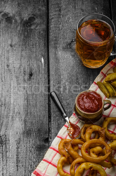 Onion rings, hot dip, french fries and Czech beer Stock photo © Peteer