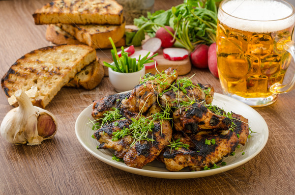 Grilled teriyaki chicken wings Stock photo © Peteer