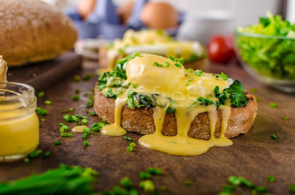 Egg benedict with spinach Stock photo © Peteer