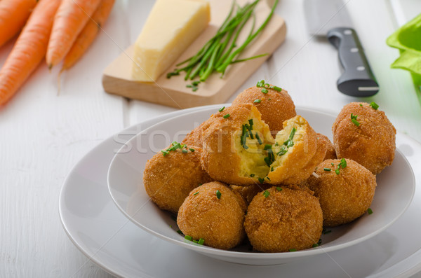 Homemade potato croquettes with parmesan and chives Stock photo © Peteer