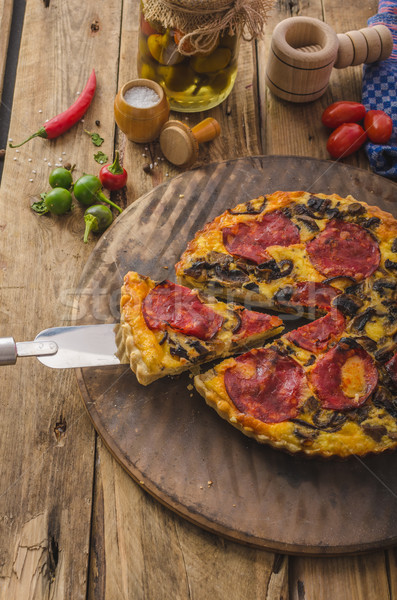 Delicious quiche with chorizo, nuts and sharp cheese Stock photo © Peteer