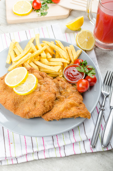 Schnitzel with french fries and a spicy dip Stock photo © Peteer