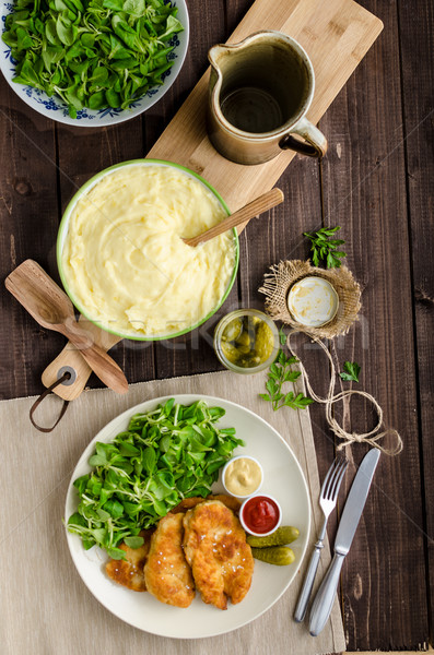 Schnitzel with mashed potatoes and salad Stock photo © Peteer