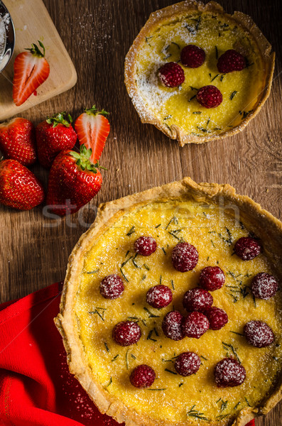 Stock photo: Lemon tart with rosemary and berries