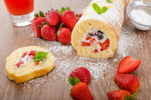 Sponge roll with strawberries and blueberries Stock photo © Peteer