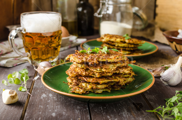 Potato pancakes with garlic and beer Stock photo © Peteer