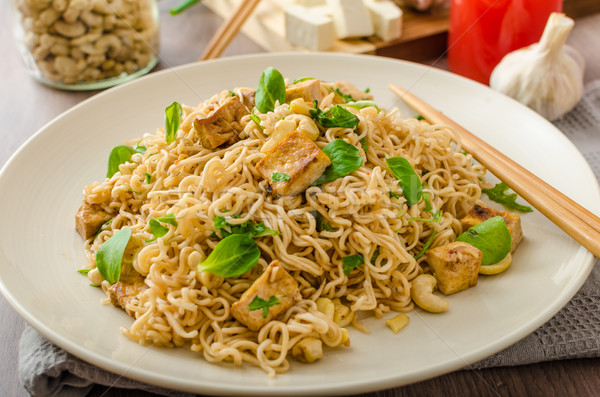 Stock photo: Chinese noodles with tofu and cashew nuts