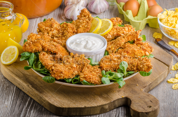 Chicken strips with delish garlic dip Stock photo © Peteer