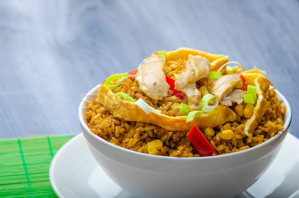 Chicken curry rice with crispy chinese omellete Stock photo © Peteer