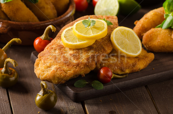 Chicken schnitzel with croquettes Stock photo © Peteer