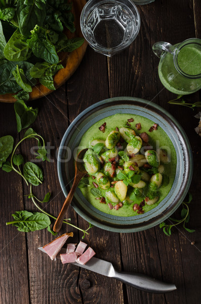 Gnocchi with bacon and basil spinach sauce Stock photo © Peteer