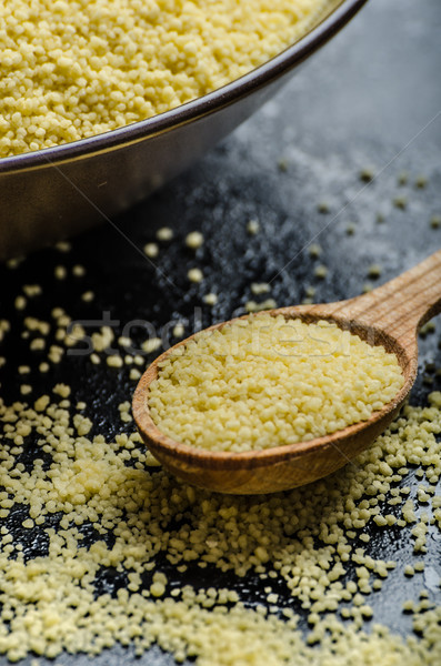 Couscous raw on table Stock photo © Peteer