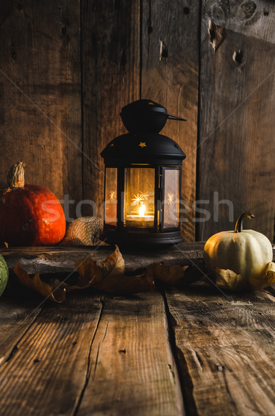 Halloween pumpkin moody picture with lantern Stock photo © Peteer