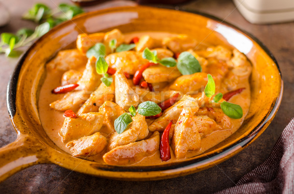 Finom curry házi készítésű kicsi fűszeres paprikák Stock fotó © Peteer