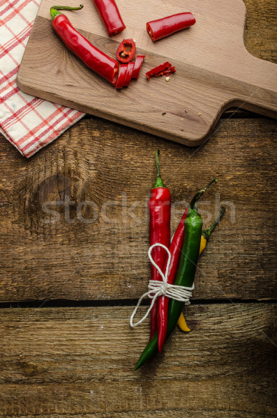 Chilli peppers, wood table, background Stock photo © Peteer