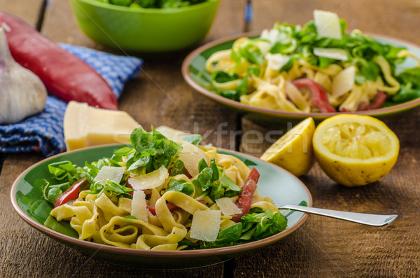 Tagliatelle with bacon, garlic and salad Stock photo © Peteer